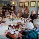 ​Volunteer hosts entertain guests to tea in their own homes. The demand for Re-engage’s service has increased considerably.