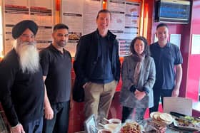 Dave Doogan and Mairi Gougeon are pictured with Ajay Kumar, Gummy Kalsi, Dave Singh and Indi Singh.