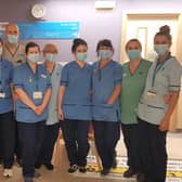 Surgical staff are pictured ready to go back to their former duties as Covid-related activity continues to decrease.