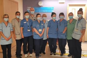 Surgical staff are pictured ready to go back to their former duties as Covid-related activity continues to decrease.