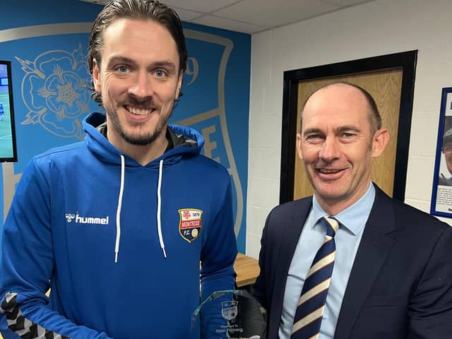 Allan Fleming receives his award from director Michael Fotheringham