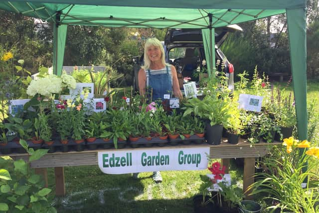 Member Veronica Engel is pictured raising funds for the group.