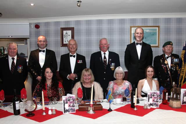 Top table guests are pictured with Major General Andrew Whitehead CB DSO (third left) and Sgt Phil Scothorne (fourth left). (Wallace Ferrier)