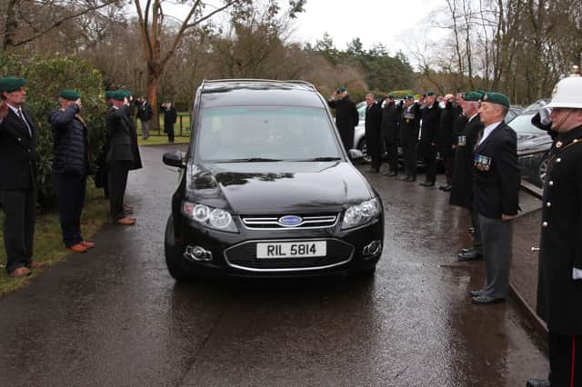 Former Royal Marines lined up at Parkgrove Crematorium pay a final tribute for comrade Lee Starkey.