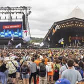 People enjoy the first proper day of Glastonbury Festival as the music gets underway.