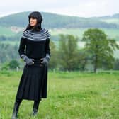 The Traitors III Claudia Winkleman rocks kilt @lekilt, knit @brorafashion and boots @newbottega - picture: BBC ,Studio Lambert, Euan Cherry