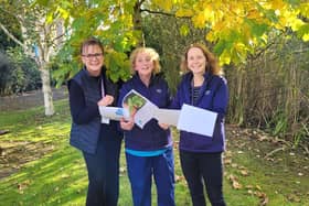 ​Lorna Strachan and occupational therapists Lynn Borrie and Lynne Hughes with the staff guide.