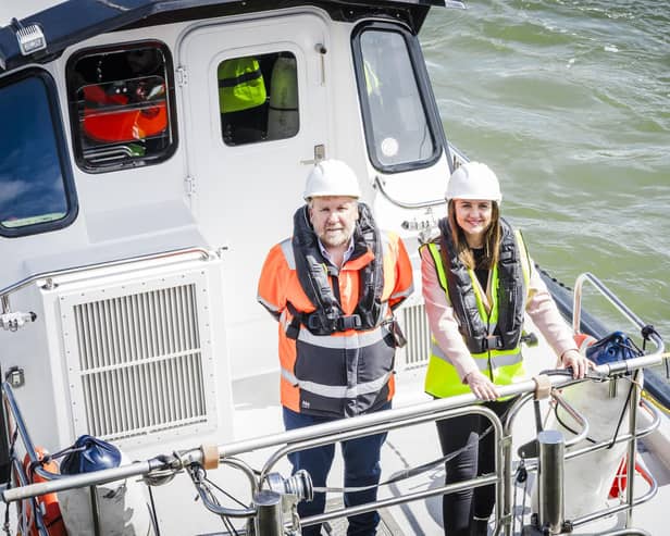 Port Authority chief executive Tom Hutchison with Mairi McAllan on board the port’s pilot boat. (Karen Jackson Photography)