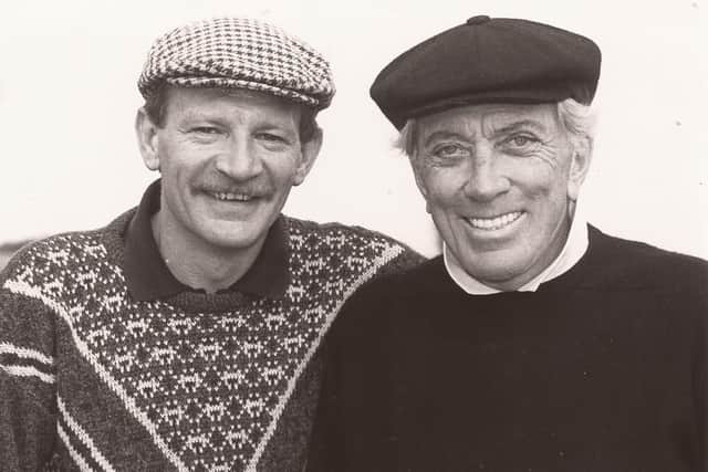 Singing star Andy William pictured with caddie Tony English in May, 2000 before teeing off for a round of golf on Carnoustie’s Championship Course.