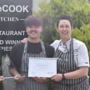 Ethan is pictured with Jeremy Parker, from NFU Mutual and Hayley Wilkes from WeeCOOK.