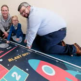 Pictured: Gail Penman, Borrowfield pupil Emma Gibson, school pupil support assistant Cherrylynne Shepherd and Emma’s dad, Mark.Mark’s employer, Orchard Flooring Products, co-sponsored the Borrowfield mats.