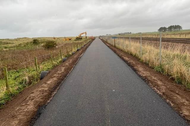 The work included raising the level of the coastal foot/cycleway