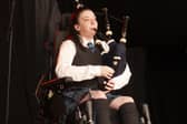 ​Katie Robertson has won fans from around the world with her piping skills, under the online name of ‘The Wheeled Piper’.
