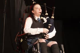 ​Katie Robertson has won fans from around the world with her piping skills, under the online name of ‘The Wheeled Piper’.