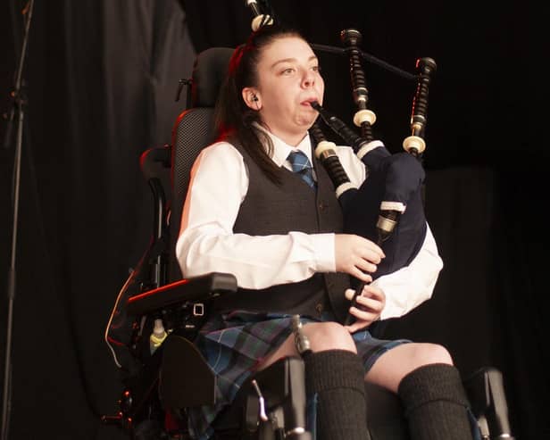 ​Katie Robertson has won fans from around the world with her piping skills, under the online name of ‘The Wheeled Piper’.
