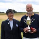 Ronnie Clark got his hand on the trophy for the second time. Pic by Scottish Golf