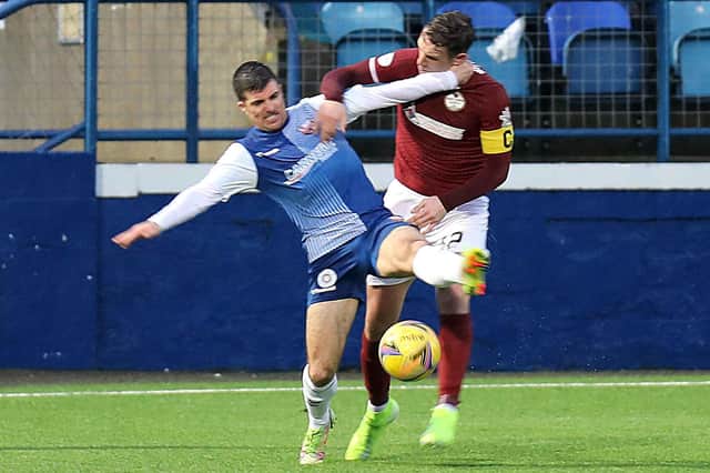 Terry Masson makes a challenge in Saturday's Scottish Cup replay against Kelty Hearts (picture by Phoenix Photography)
