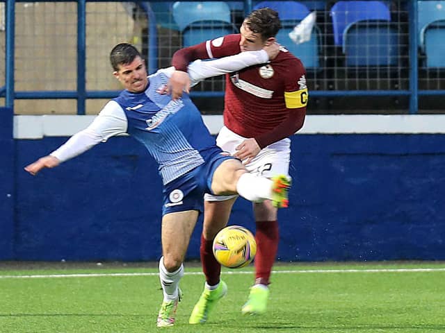 Terry Masson makes a challenge in Saturday's Scottish Cup replay against Kelty Hearts (picture by Phoenix Photography)