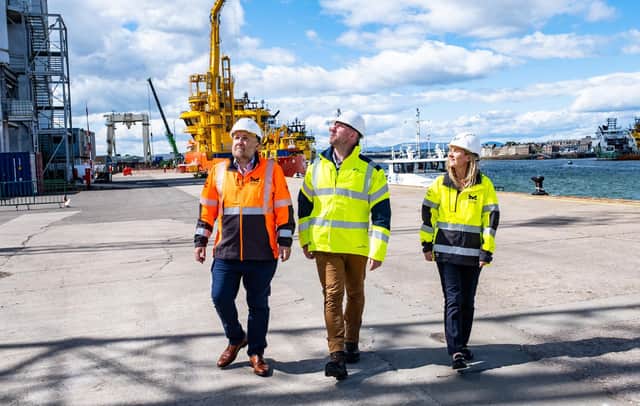 Tom Hutchison, Neil Gray and Ann Rooney, Port Chief Commercial Officer, enjoy a tour of the facilities.