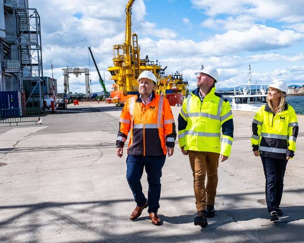 Tom Hutchison,  Neil Gray and Ann Rooney, Port Chief Commercial Officer, enjoy a tour of the facilities.