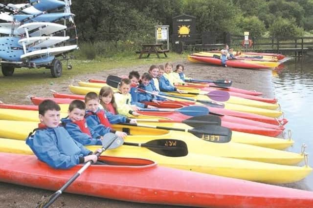 Ready to hit the water at Monikie Country Park in July, 2004 were the kids from the Out of School Clubs at Ladyloan and Muirfield Primaries.