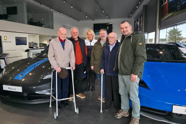 Harry Corsie and Jim Christie, Lethen Park residents, visit the Aberdeen Porsche garage