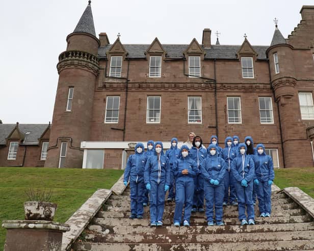 ​The children are pictured ready to tackle the world of forensics.