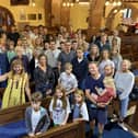 ​Some of the Scott party are pictured inside the church.