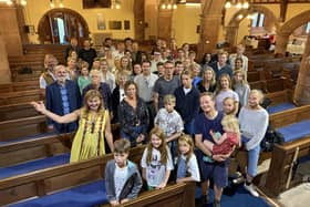 ​Some of the Scott party are pictured inside the church.