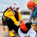 Cocker spaniel Skye with members of the Arbroath lifeboat crew.