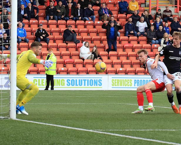 Cammy F Ballantyne finds the back of the net for Montrose but the joy wouldn't last. Pic by Phoenix Photography