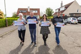 Pictured (from left) are People's Postcode Lottery winners Moira Thom, Graeme Carnegie, Chrstine Glass and Jamie Cooper
