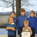 Airlie Primary School Reading School Committee - Back - Heather, Lochryn, teacher Mrs Sharpe. Front - Esmay, Aonghus