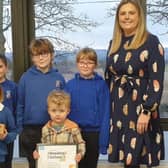 Airlie Primary School Reading School Committee - Back - Heather, Lochryn, teacher Mrs Sharpe. Front - Esmay, Aonghus