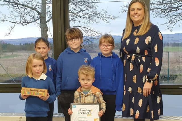 Airlie Primary School Reading School Committee - Back - Heather, Lochryn, teacher Mrs Sharpe. Front - Esmay, Aonghus